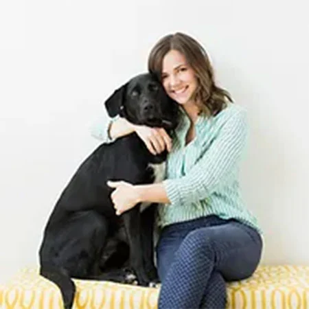 Girl Hugging Her Dog